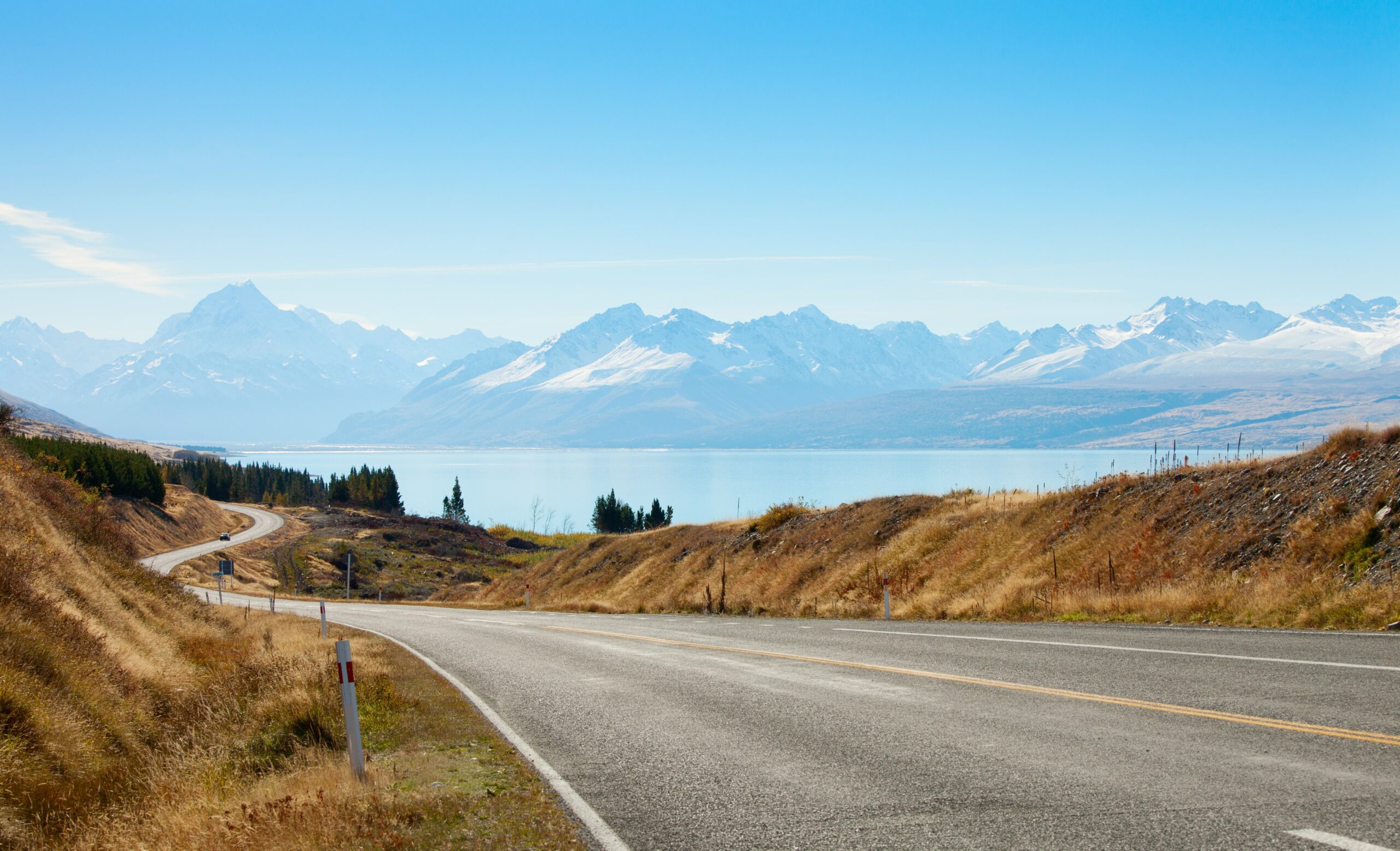 213e100ecb2b246d6751e24bcc35b306d70ca037-min Long road in countryside